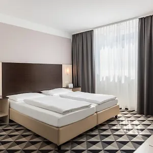 מלון Acom-hotel